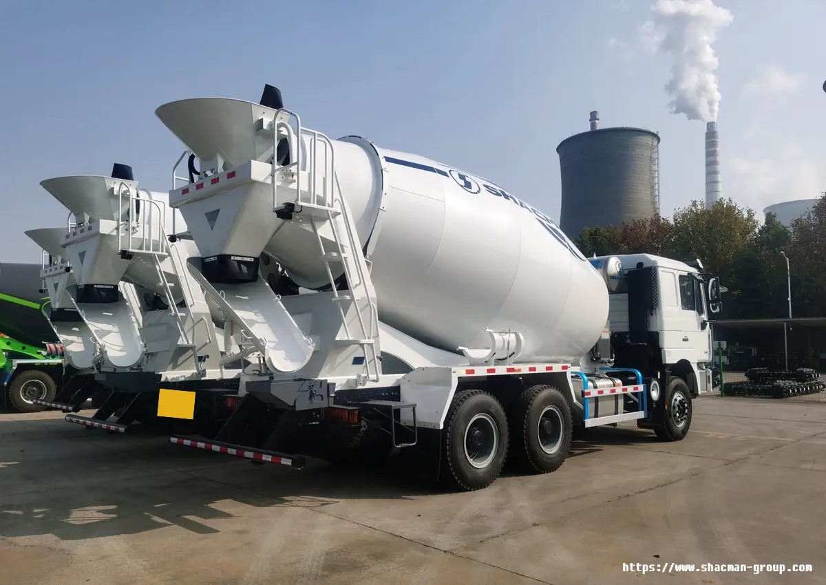 Fleet of SHACMAN concrete mixer trucks rear view ready for shipment to Uganda