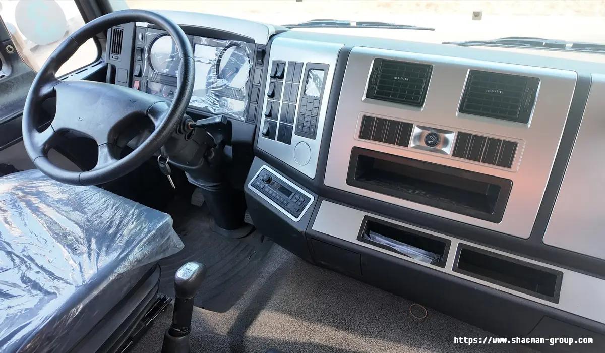 SHACMAN L3000 truck interior dashboard and steering wheel close-up