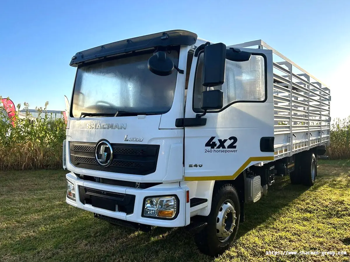 White SHACMAN L3000 4x2 stake cargo truck with 240 horsepower for sale in Uganda