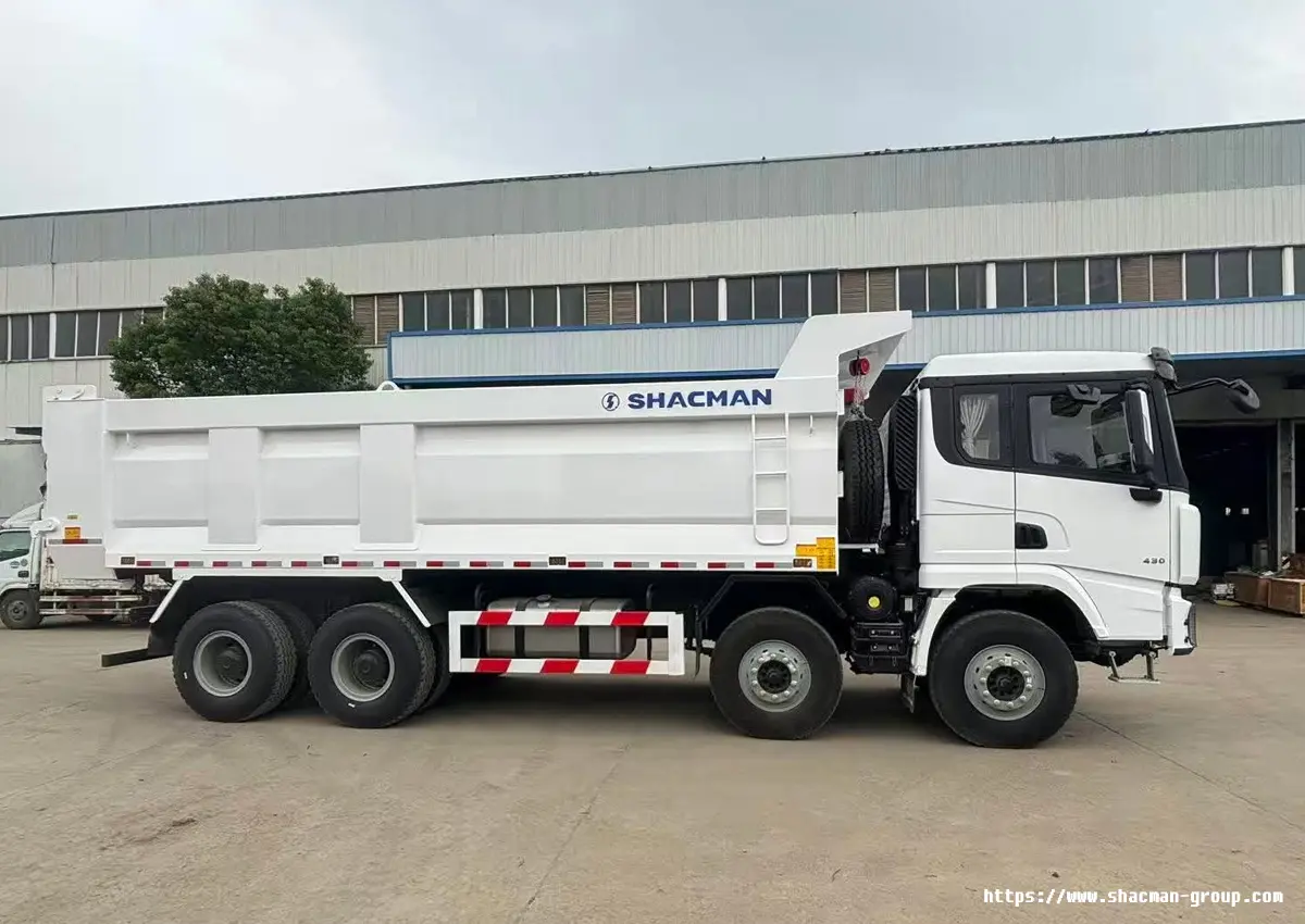 White SHACMAN X3000 8x4 dump truck side view for sale in Uganda