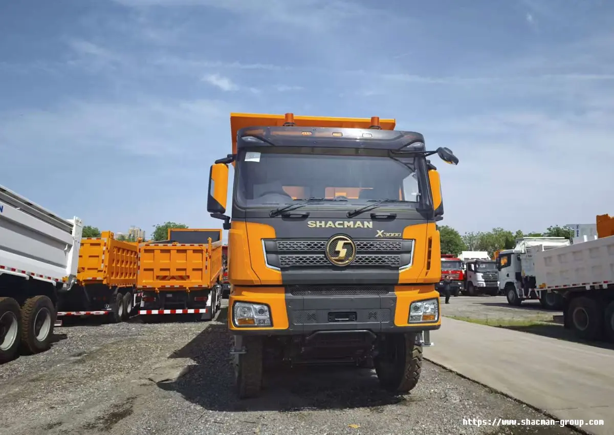 Orange SHACMAN X3000 dump truck front view for sale in Uganda