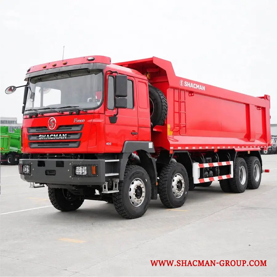 Red Shacman F3000 8x4 dump truck for sale in China, parked at an export yard.