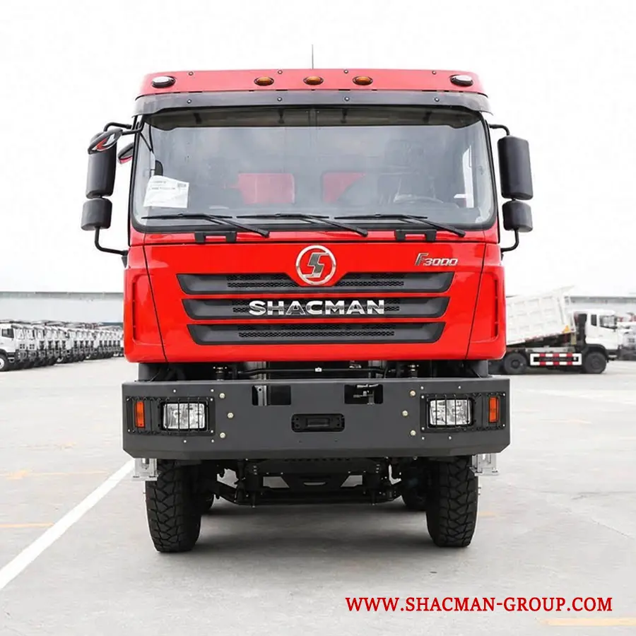 Red Shacman F3000 8x4 dump truck for sale in China, parked at an export yard.