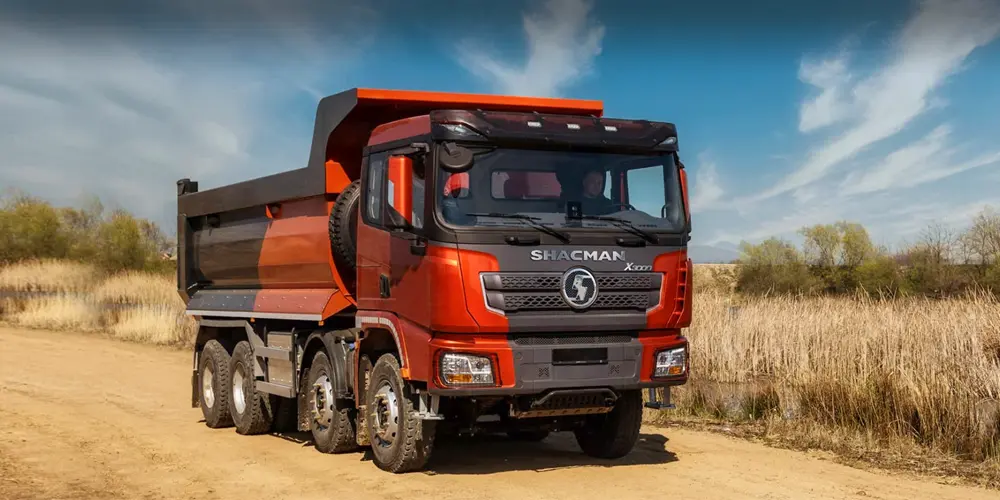 SHACMAN X3000 tipper truck in SHACMAN tipper truck delivering construction materials in Ghana