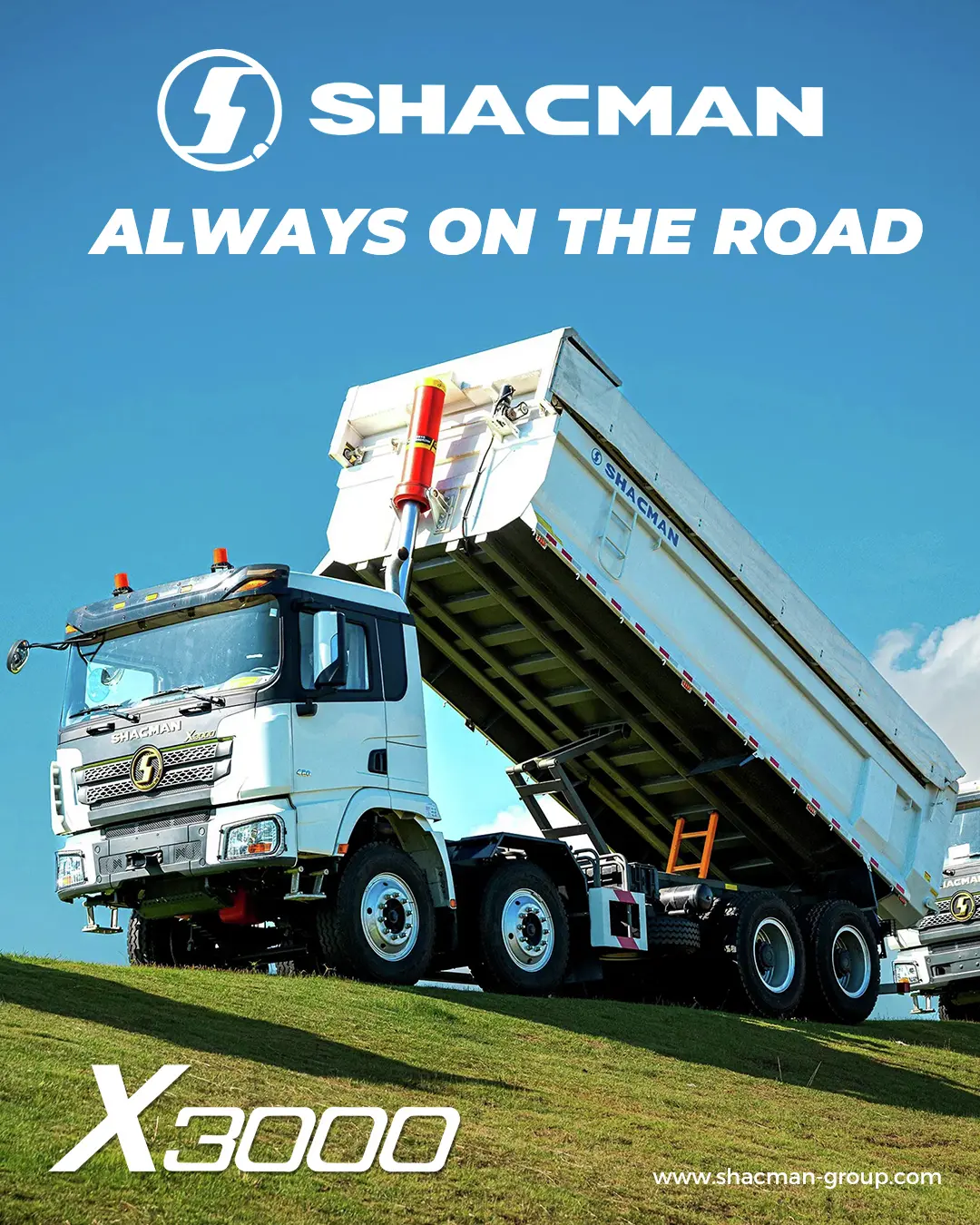 White SHACMAN X3000 8x4 tipper truck raising its dump body on a construction site